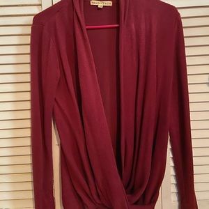 Red draping sweater
